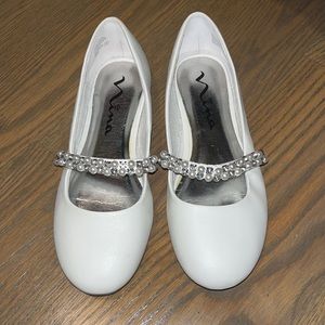 Girls white dress shoes.